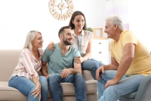 This advice for in-laws can keep great relationships with married children, like this photo of an elderly couple with their married children illustrates.