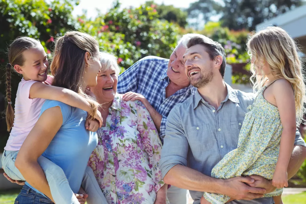 Good relationships with your in-laws is important. Here's an extended family laughing and getting along well.