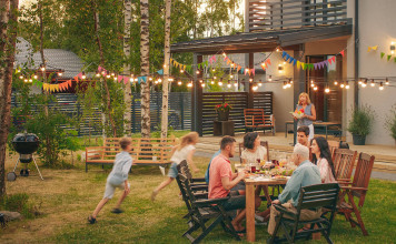 Festive dinner party held in a backyard