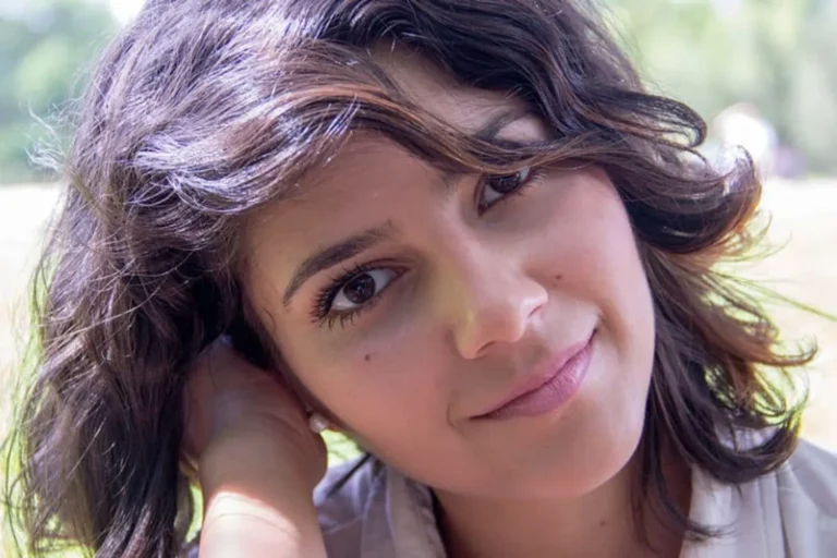 Teen girl up close and smiling gently