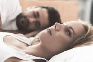 Wife ponders whether she married the wrong man as he sleeps in background