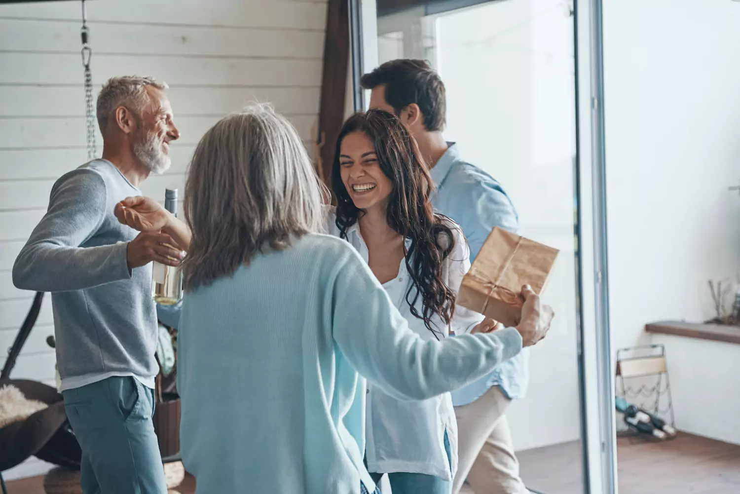 A married couple receives a warm welcome from their in-laws. Building in-law relationships is important.