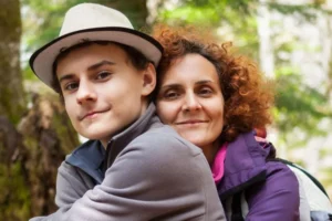 A teen boy with his mother