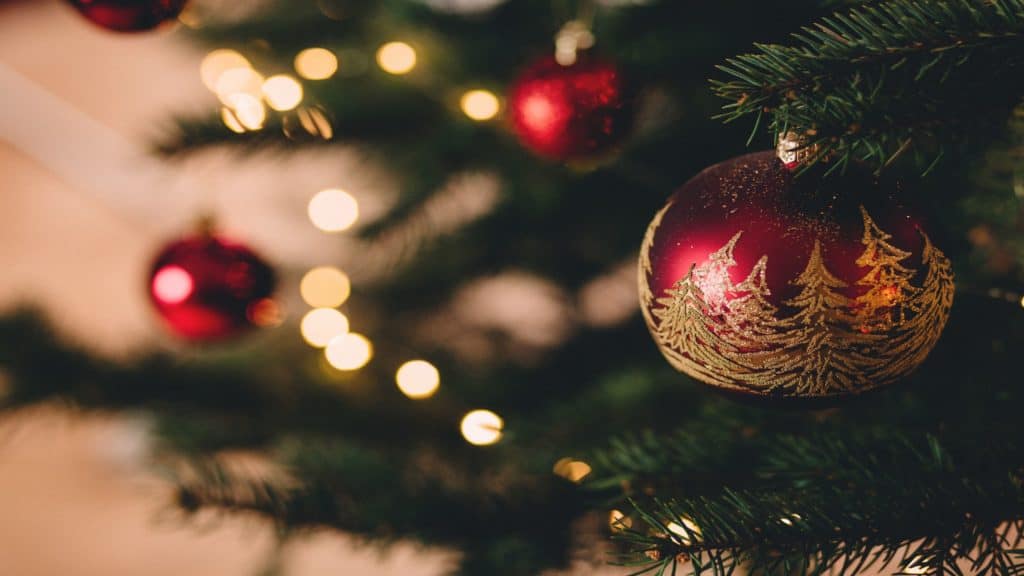 red bauble on christmas tree