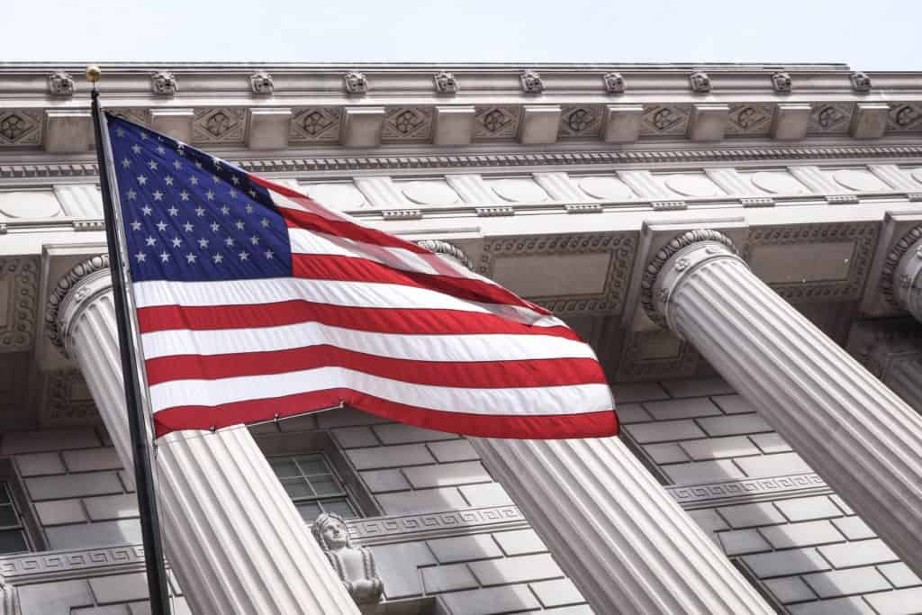 American flag in front of government building