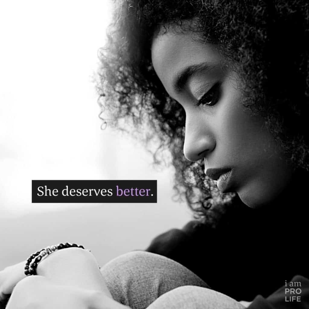 A young African American girls sits by the phrase "She deserves Better," on how to Identify the victims of sex trafficking.