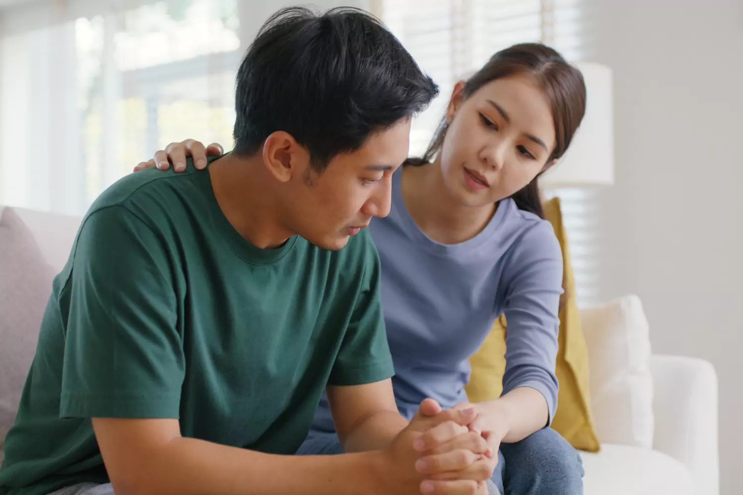 A young wife gives her husband encouragement.