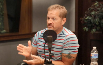 Comedian Tim Hawkins being interviewed in the Focus on the Family broadcast studio