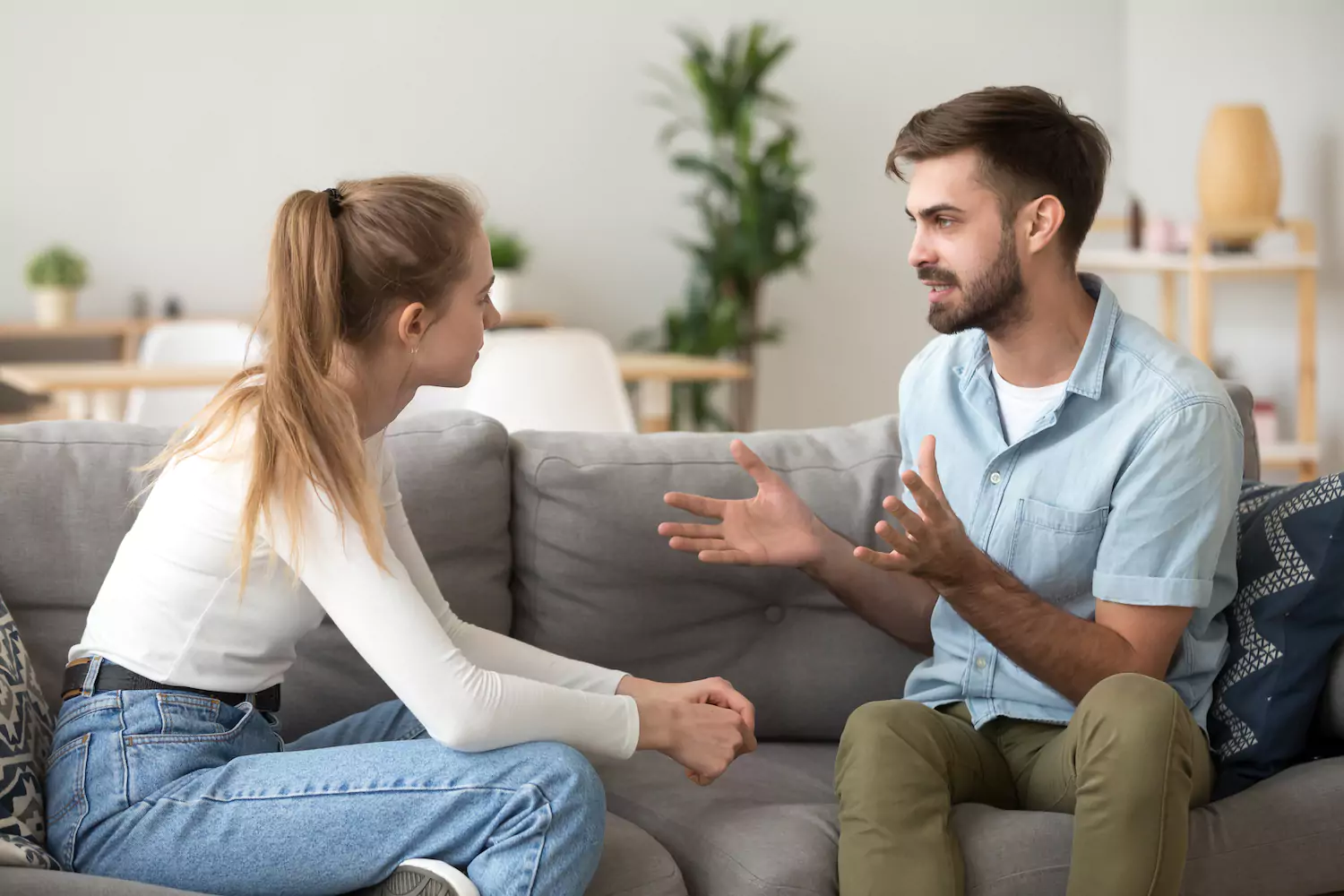 Remarriage doesn't wipe away memories and old habits. When such habits arise take time to discuss them, like this couple sitting on this couch.