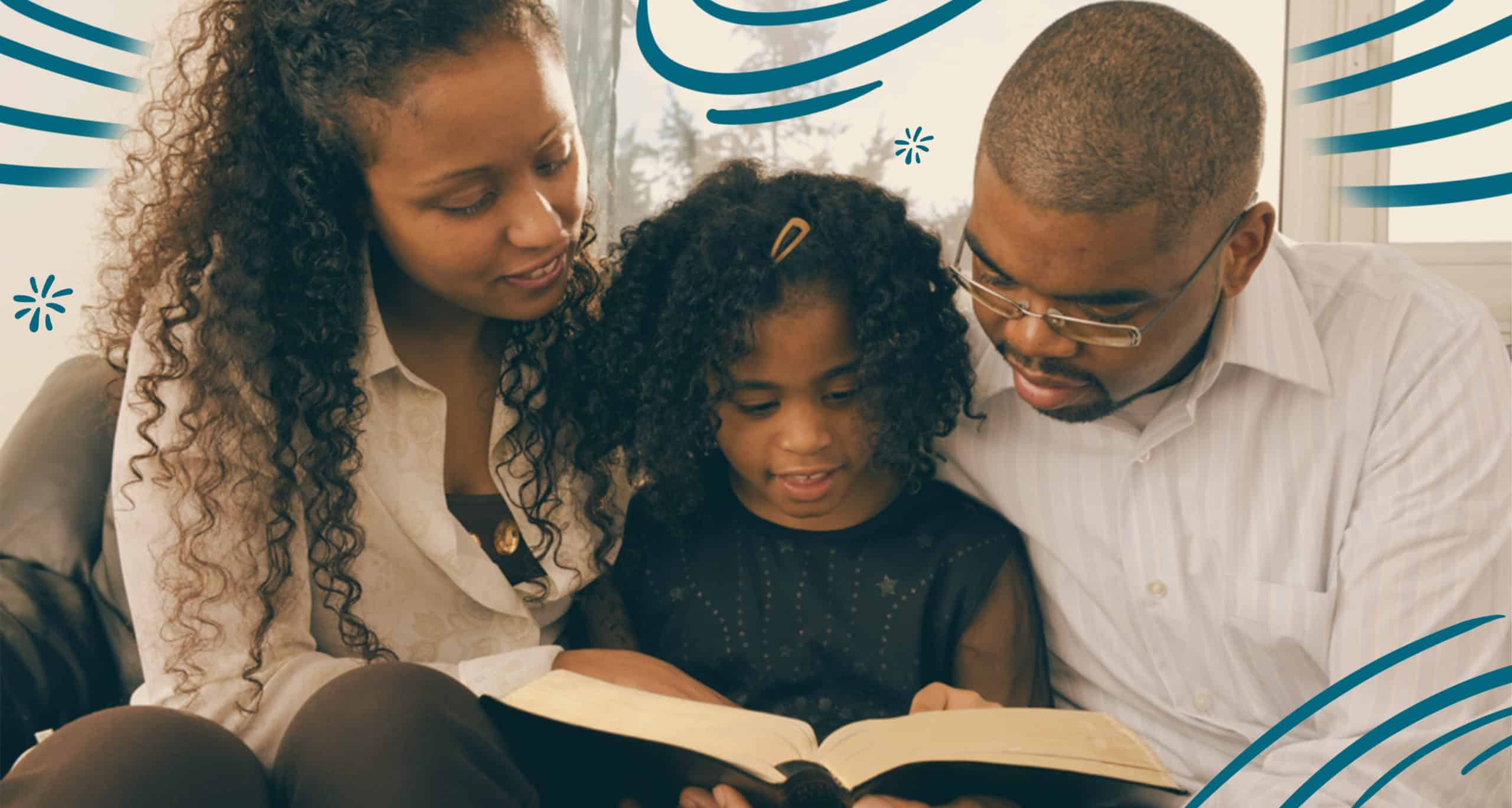 Mom and dad sitting on the couch with their young daughter and studying the Bible together