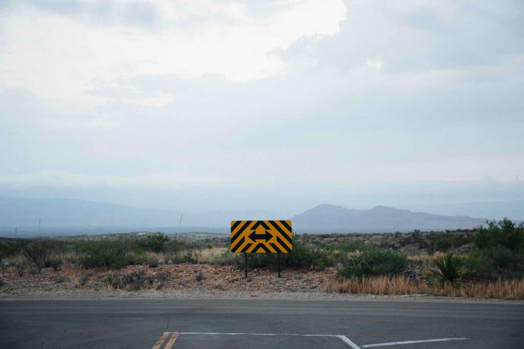 Dead-end road with a sign cautioning you to turn left or right