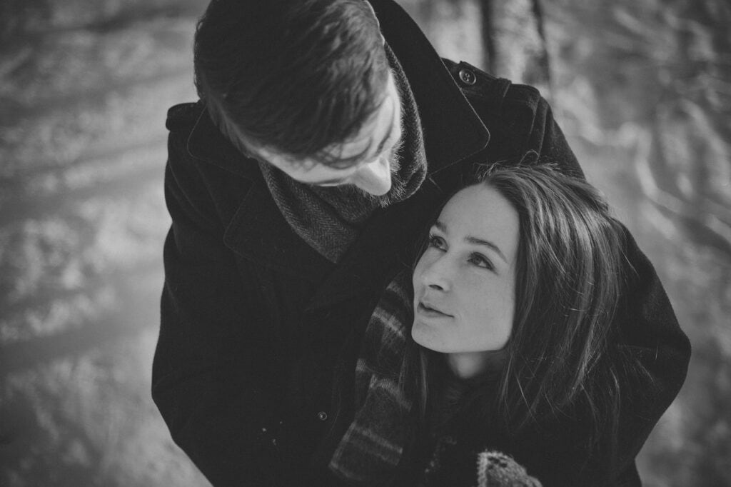 Black and white pic of husband and wife gazing at each other