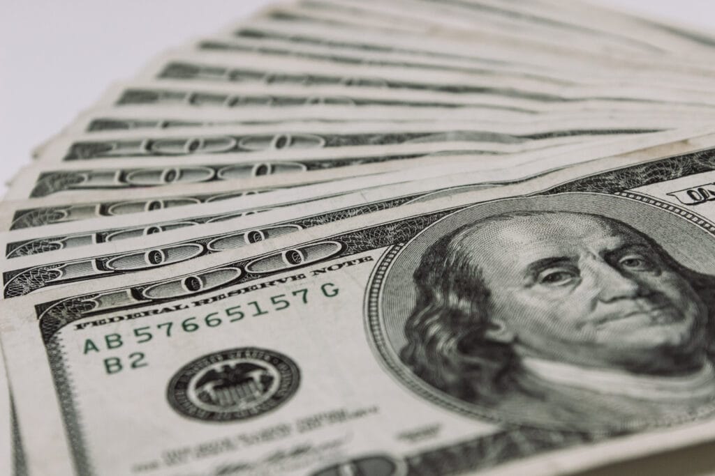 Hundred dollar bills fanned out USD