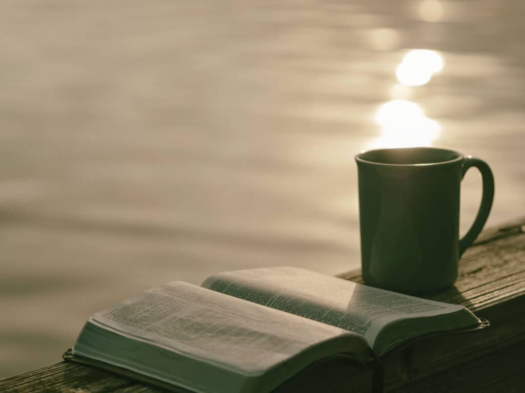Bible coffee seashore sunrise