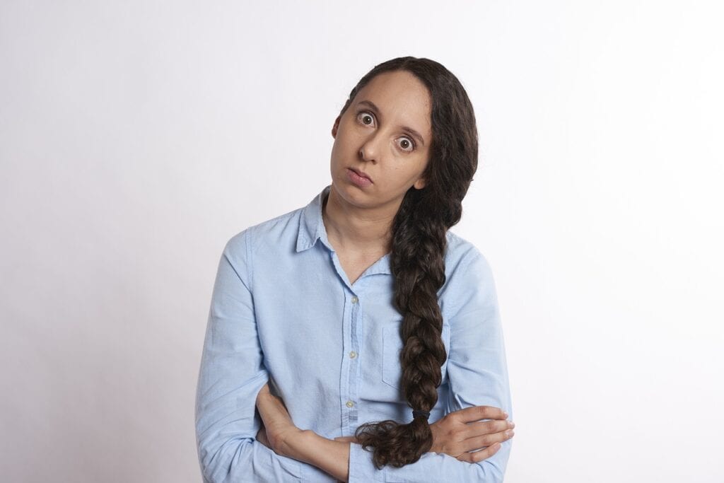 Exasperated woman looking into camera