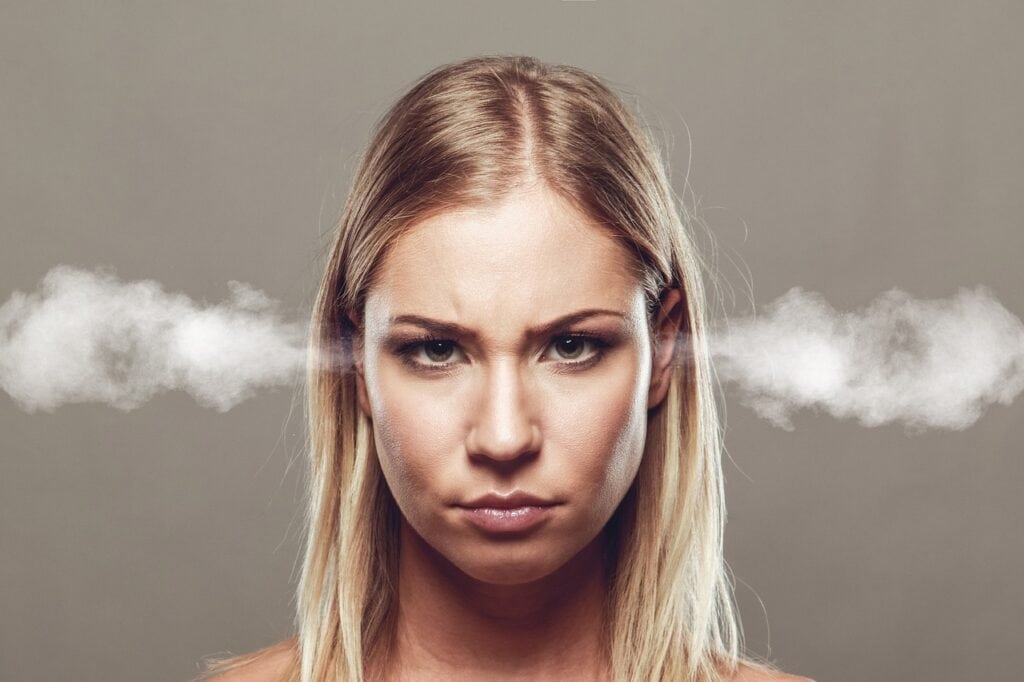 frowning woman steam coming out of ears