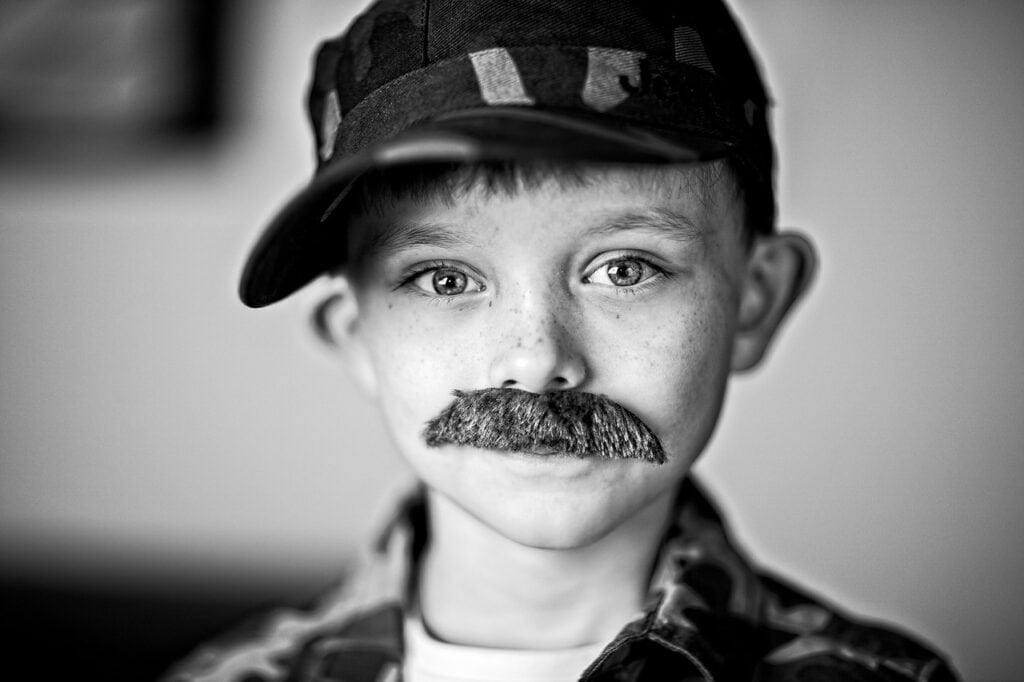 boy with fake moustache