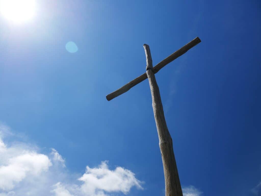 cross under a blue sky