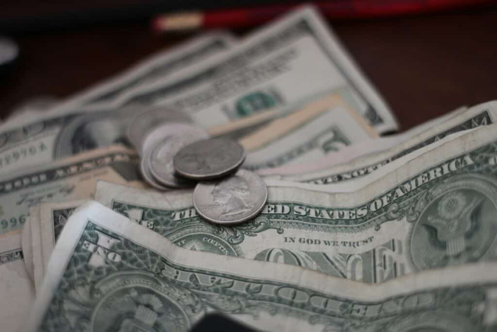 dollar bills and coins USD