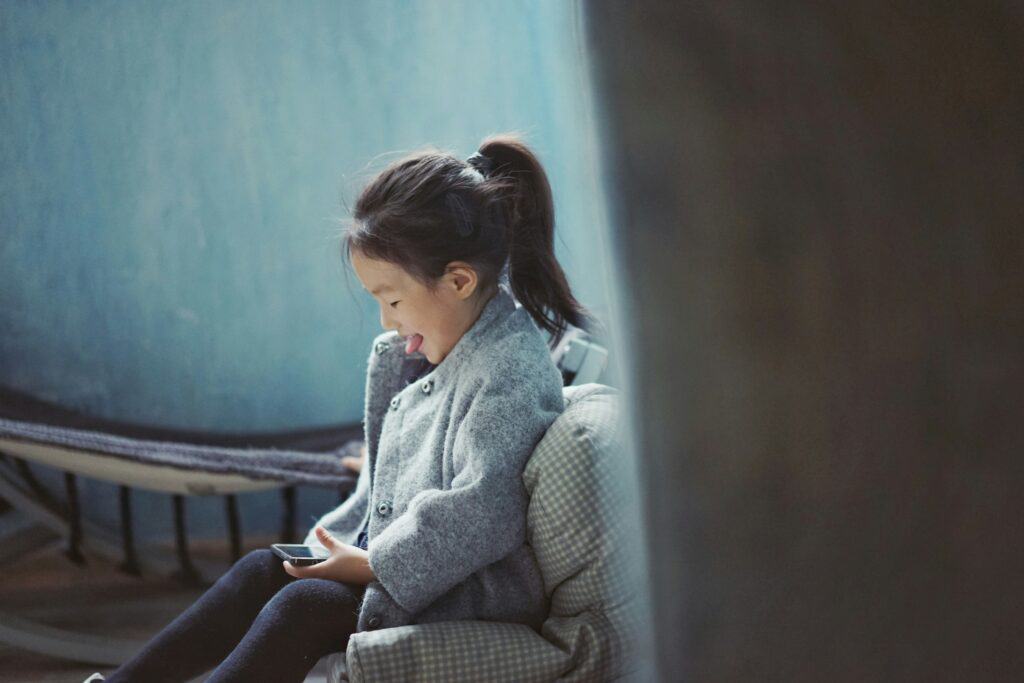 girl looking at cell