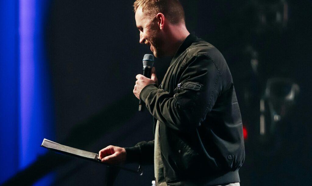 pastor blue light Bible microphone sermon