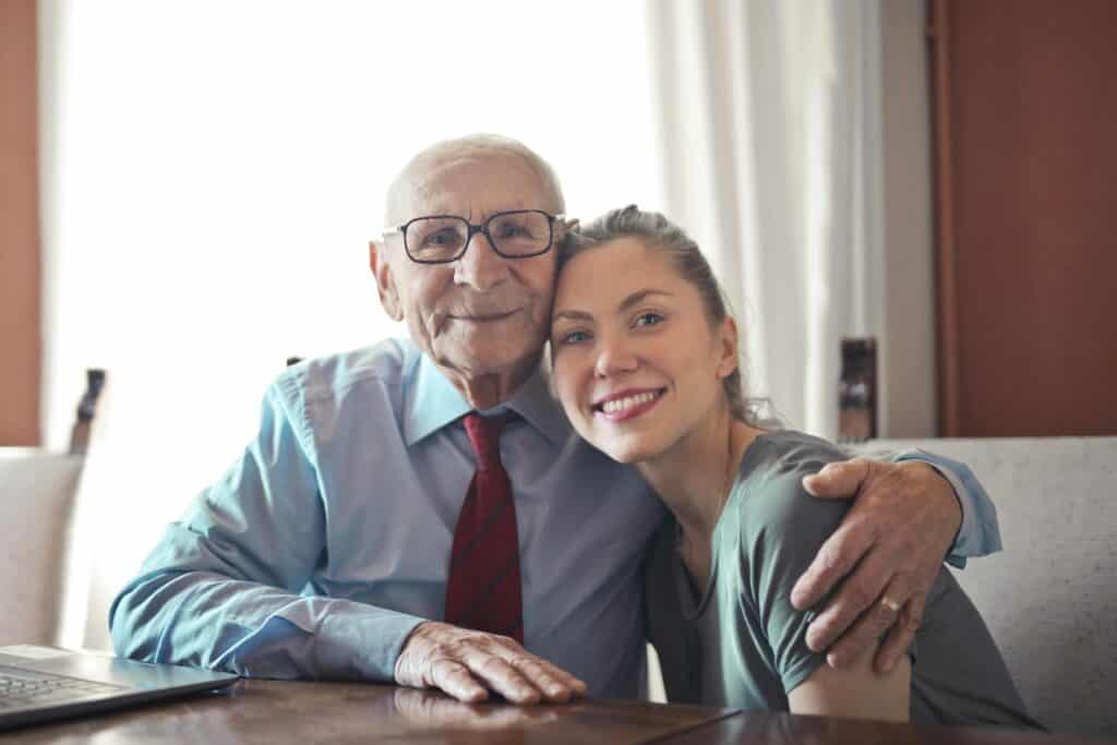 grandfather and college aged granddaughter