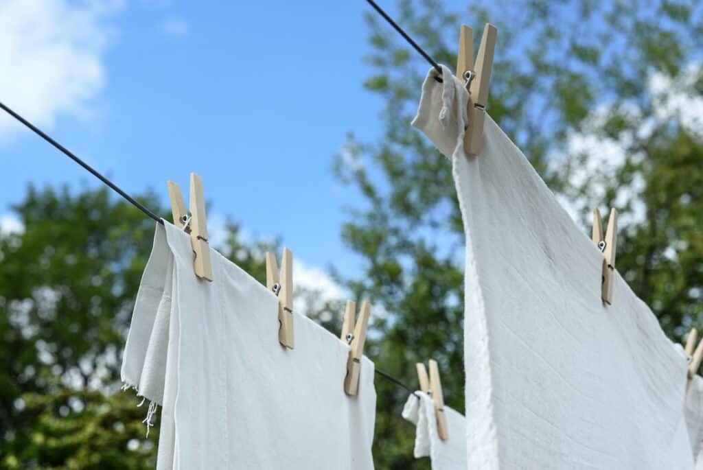 sheets hanging on clothesline