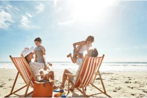 Family of four on the beach