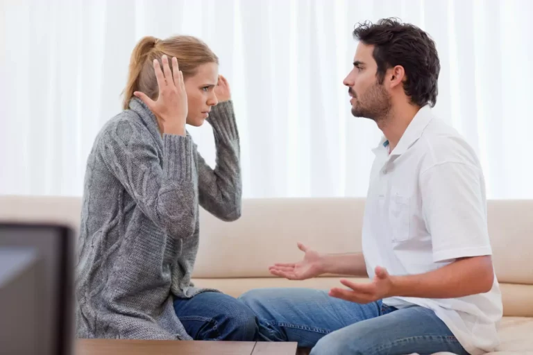 A couple on the couch argues. Why do couples fight? Most often they fight about trivialities and nothing.