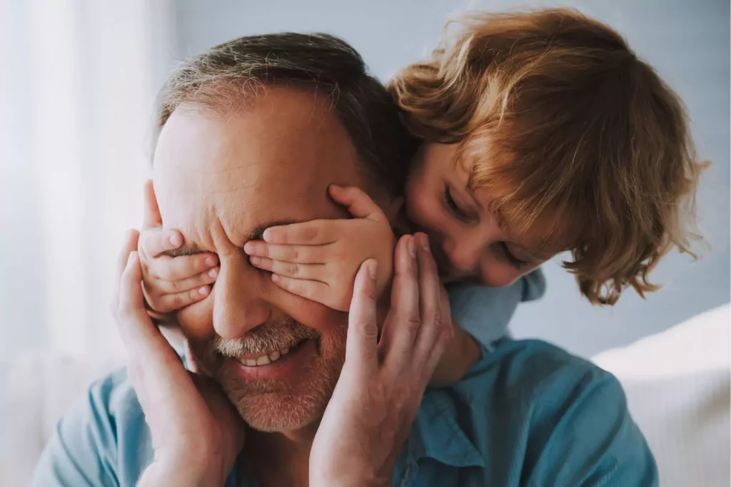 Grandfather and grandson. Building deep connection with grandparents playing together.