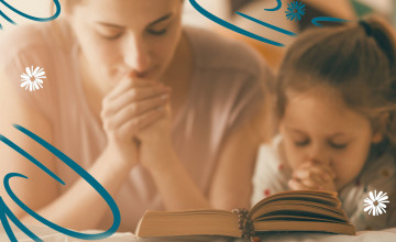 Mom and daughter pray together