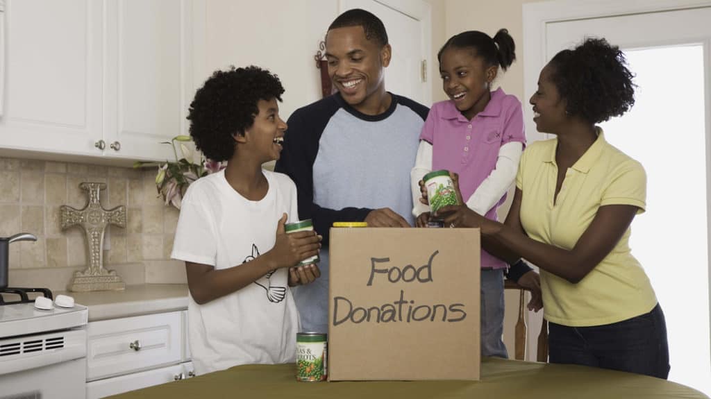 A family exciting about donating food