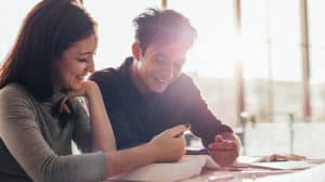 husband and wife read devotions together