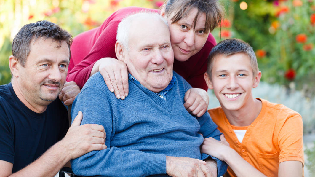 A grandfather with his family