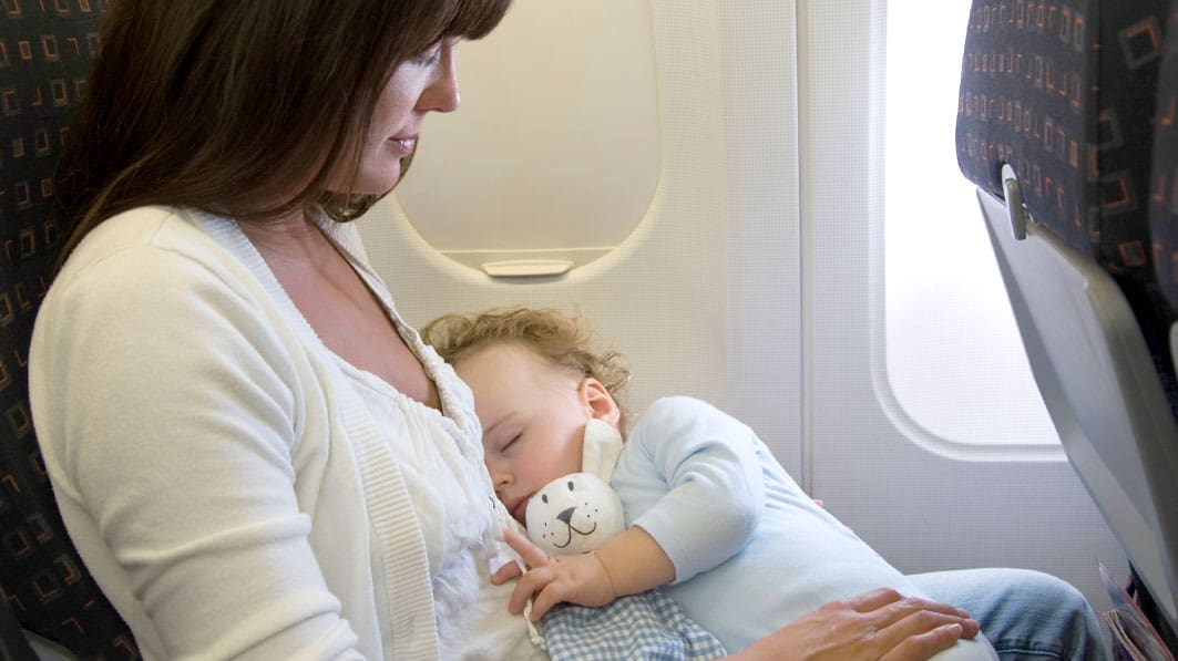 Mom and infant on a plane
