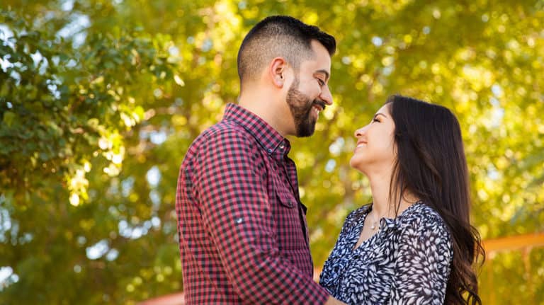 Happy couple looks into each other's eyes