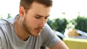 Sad man looking downward