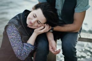 husband holding wife's face