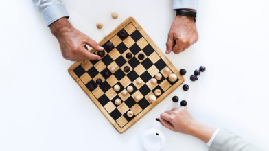 Two people playing chess