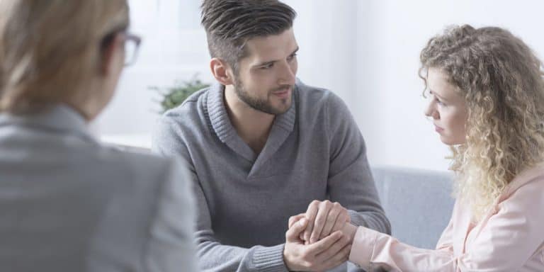 Couple talking to a therapist