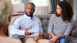 a couple in counseling for marriage crises