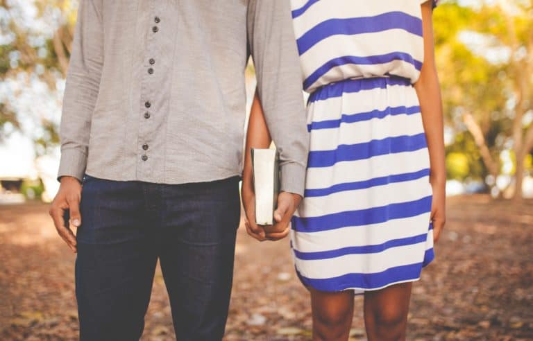 couple holding a bible