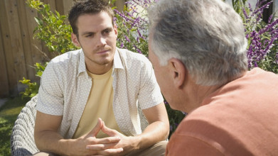 mentor and mentee talking outside