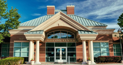 Front view of the main entrance to the Focus on the Family Welcome Center in Colorado Springs, CO.