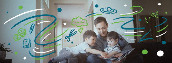 Fatherhood. Picture of dad sitting with two sons