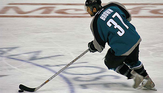 Curtis Brown, playing ice hockey