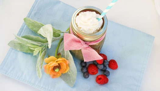 Smoothie in a mason jar on a doily, shown from above