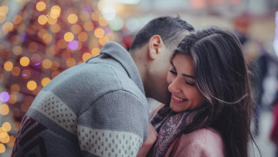 Couple's Christmas a husband and wife hugging