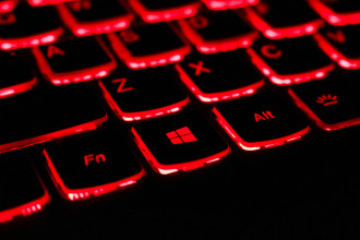 Protect children by teaching them about online predators. Picture of red keyboard