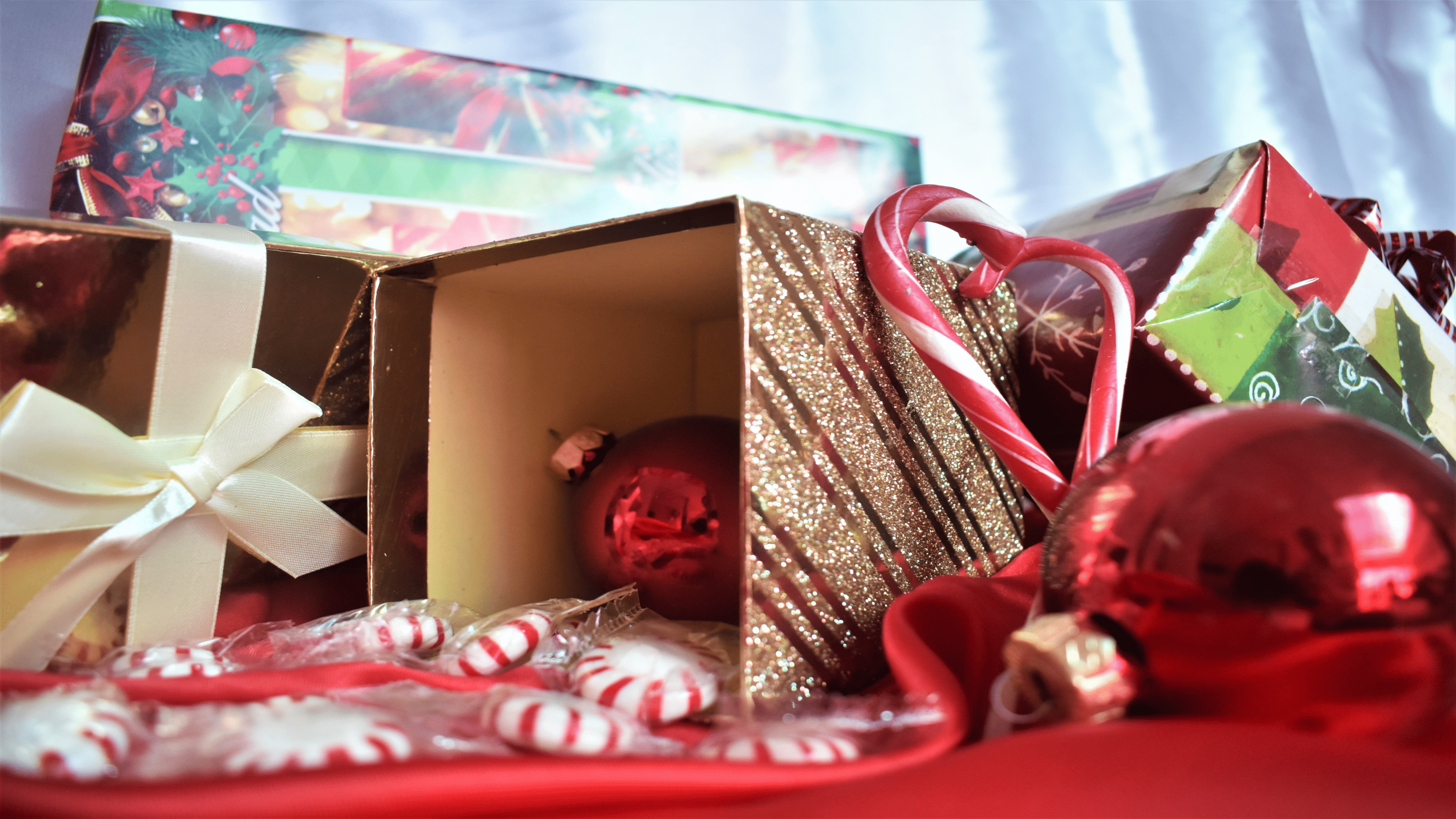 Close up of collection of Christmas presents and decorations